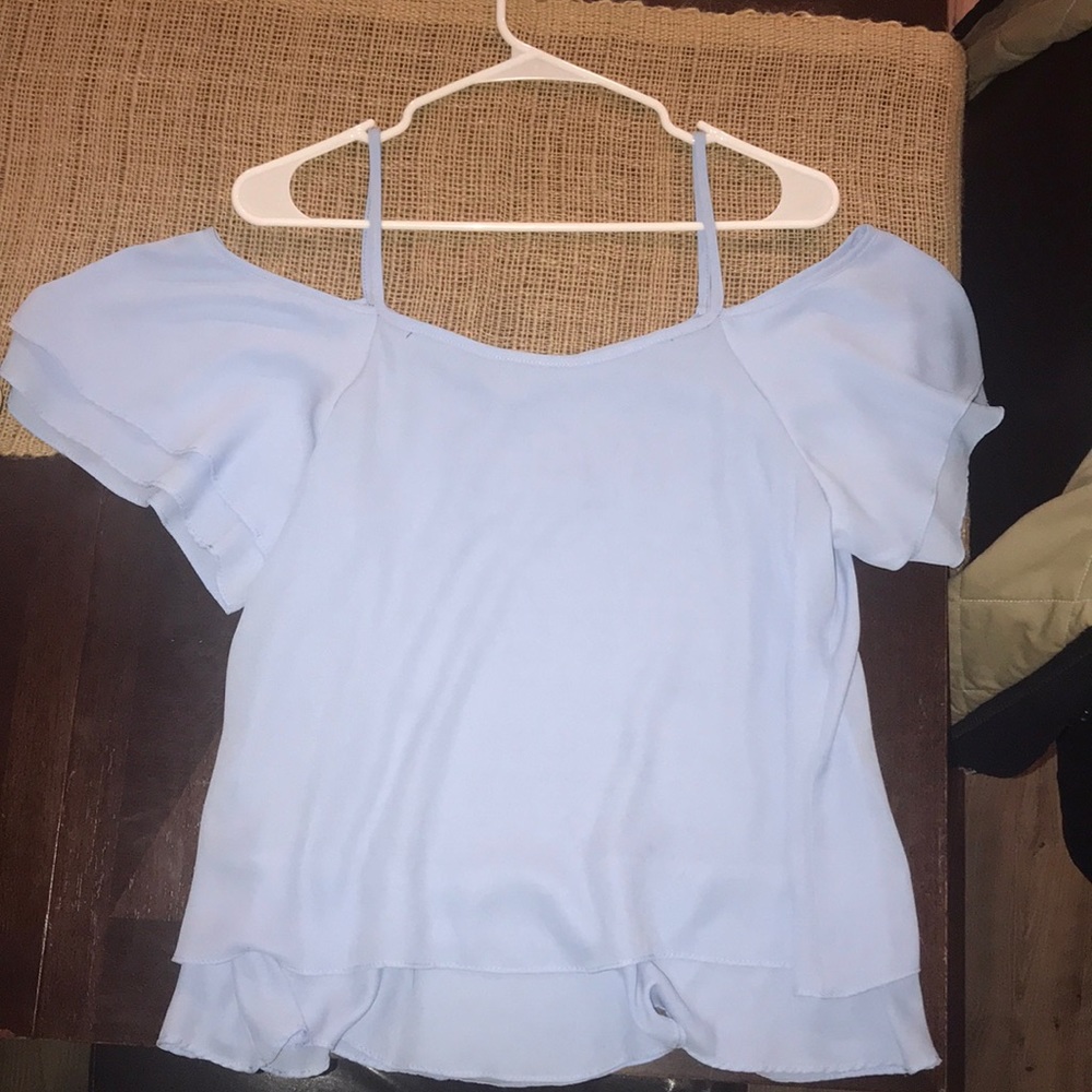 A baby blue off the shoulder shirt sooo cute!!